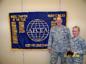 In January, Col. Curtis Piontkowsky, USAF, chapter president, presents 1st Lt. Kayla Georgiafandis, USAF, with the chapter's AFCEAN of the Month Award.